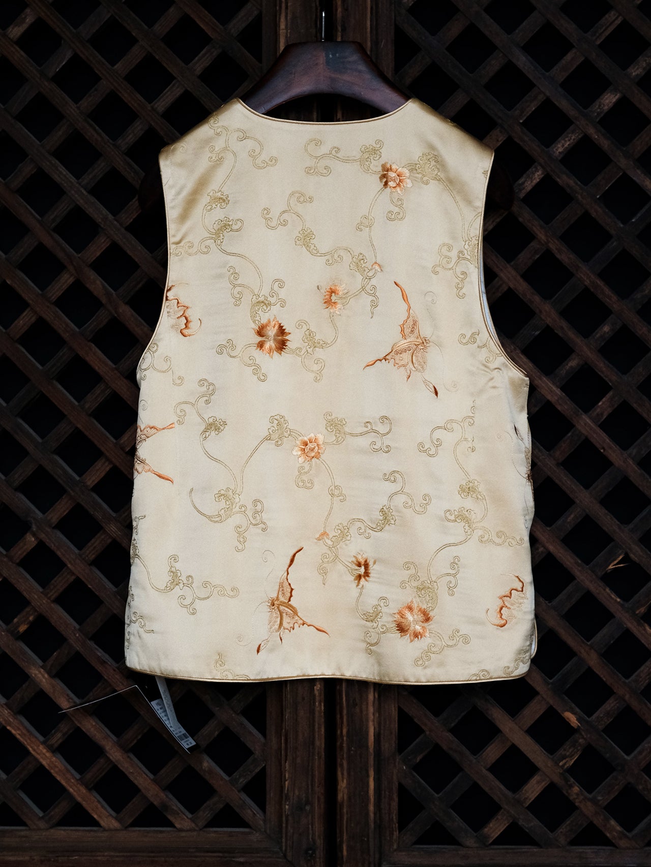 Pale yellow butterfly-patterned silk vest